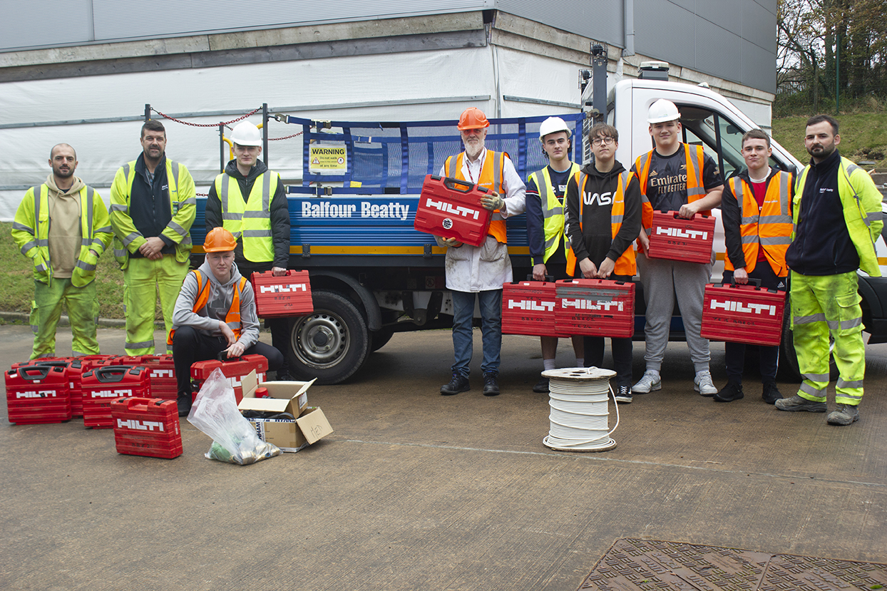 Equipment is presented by Balfour Beatty to Lakes College staff and students