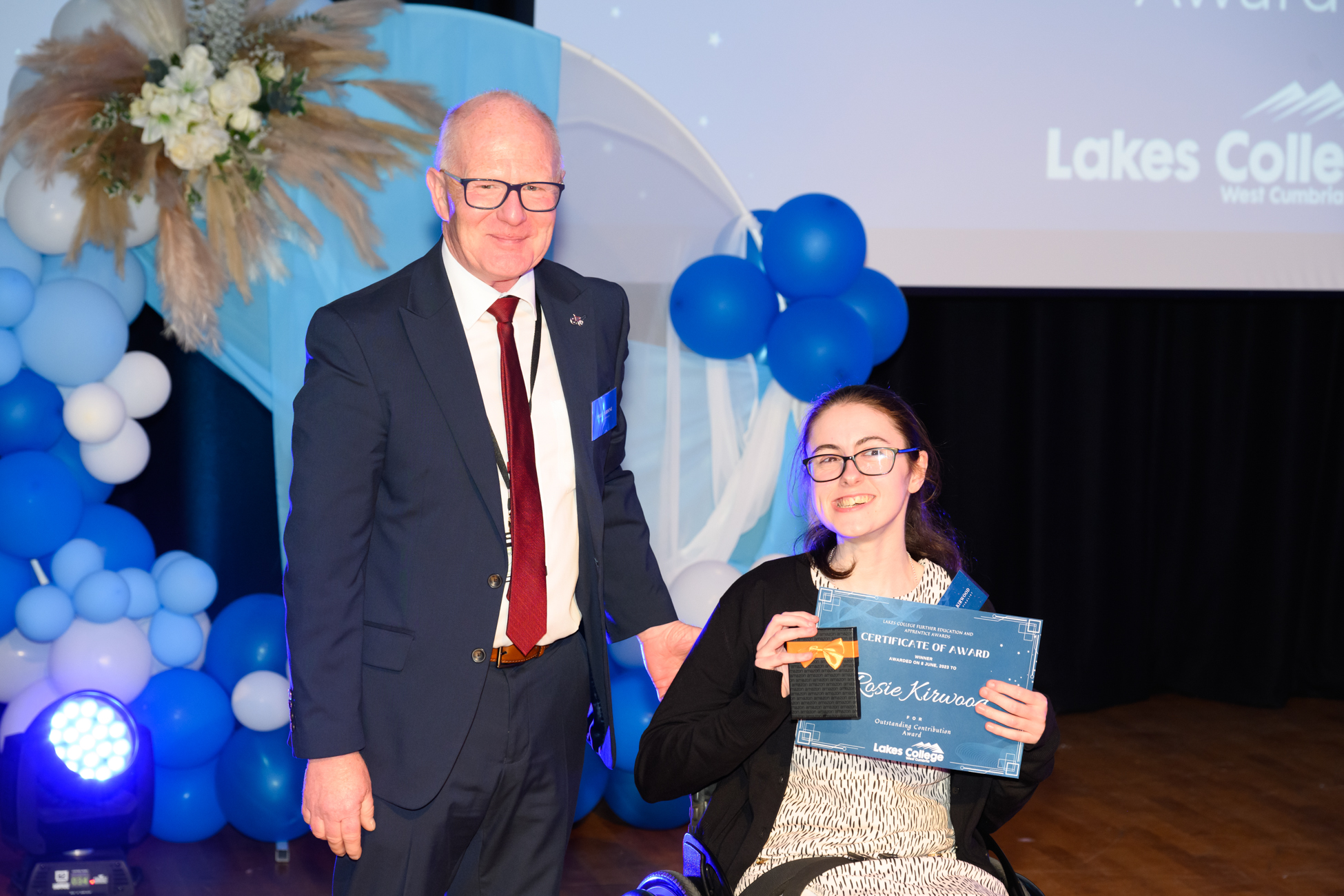 Vice chair of governors Phil Jardine with Rosie Kirwood, winner of the Exceeding Expectations award